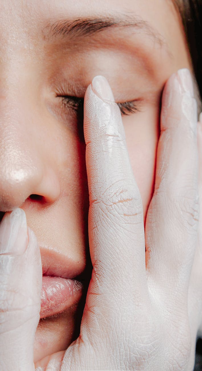 woman face and fingers