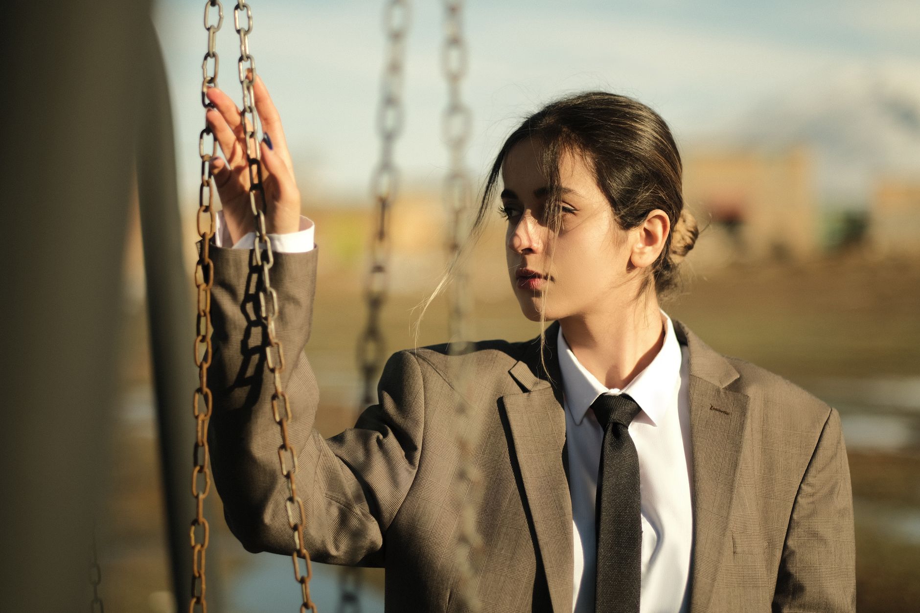portrait of a woman wearing a male suit