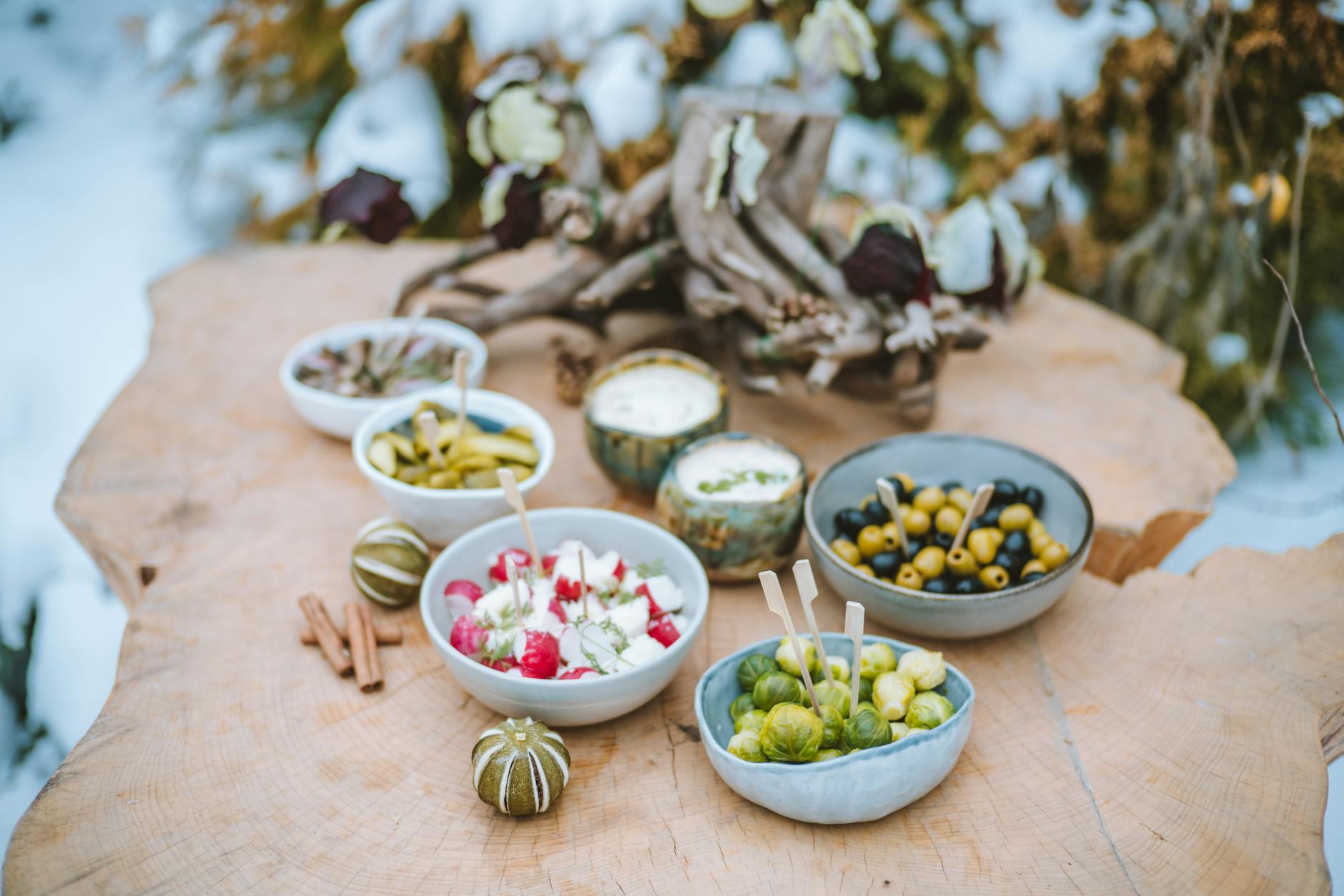 foods in bowls over a tree table