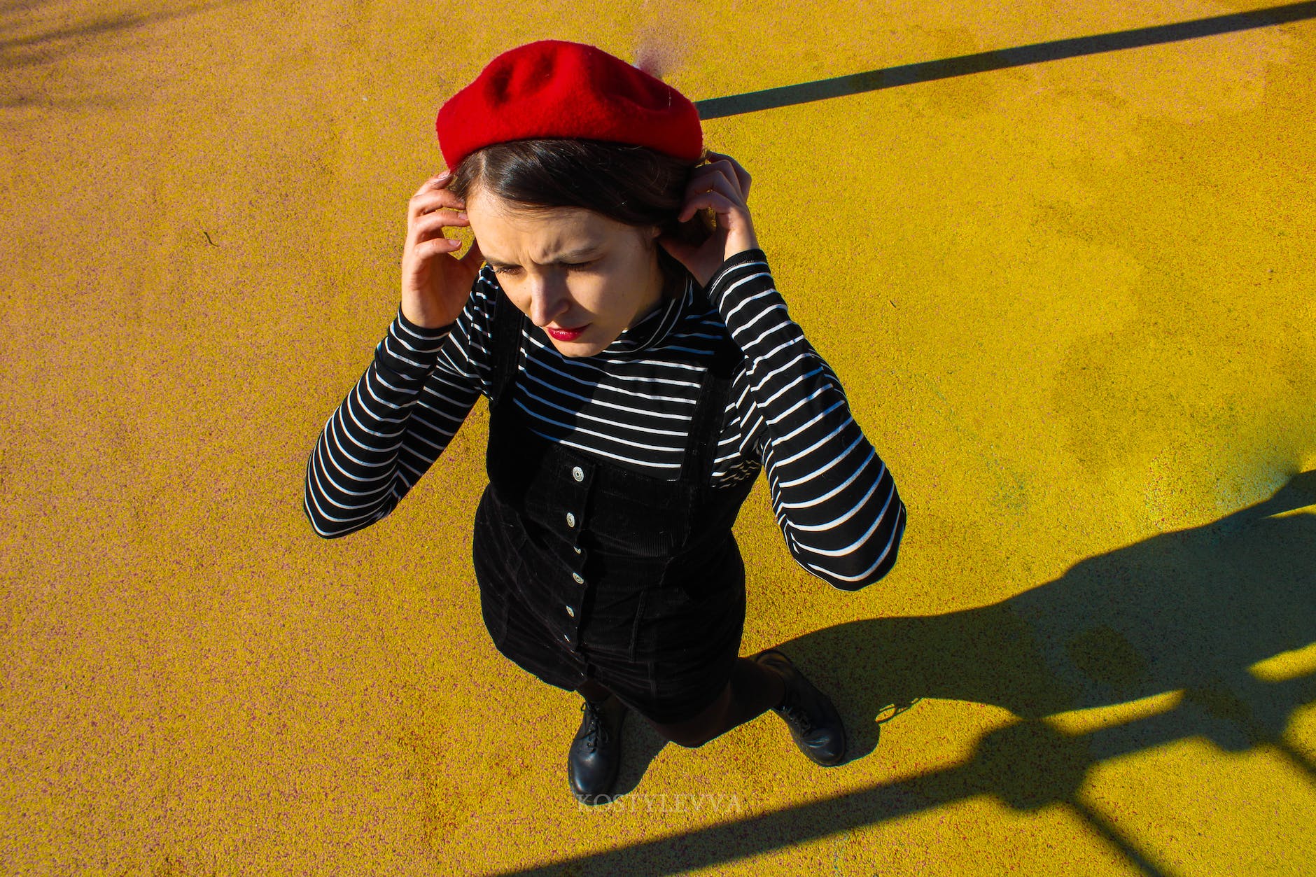 high angle view of a woman wearing a red beret